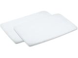 a pair of white bath mats sitting on top of each other