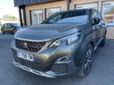 a grey suv parked in front of a building