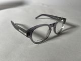 a pair of glasses that are on a table