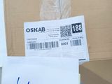 a box that has a pair of scissors in it