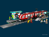 a lego train that is on the tracks with people on it