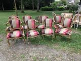 a lot of chairs that are sitting in the grass