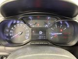 a close up of a car dashboard with a speedometer and gauges