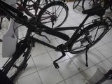 a bike that is sitting on the floor in a room