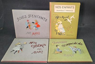 trois livres pour enfants sont alignés sur une surface noire