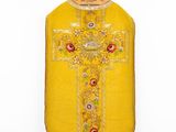 an image of a yellow vest with a cross on it