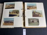 an open book with pictures of a farm and buildings on it