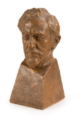 buste en bronze représentant un homme barbu sur fond blanc