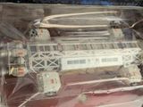 a model of a space station in a plastic case