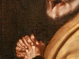 an old painting of a man holding a cross and praying