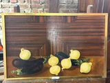 a picture of a painting of lemons and peppers on a table