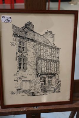 a picture of a drawing of a building in a frame