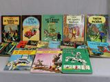 plusieurs livres pour enfants sont alignés sur une table