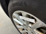 a close up of a tire with a sticker on it