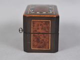 an image of a small wooden box sitting on top of a table