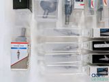 many different types of tools in a plastic box