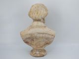 a marble bust of a woman on a white background