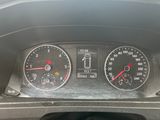 a close up of a car ' s dashboard with a speedometer