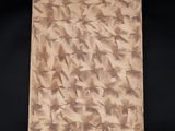 an image of a piece of paper with a pattern of leaves on it