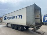 a semi truck that is parked in a parking lot