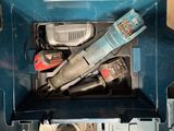 a blue tool box with tools inside of it