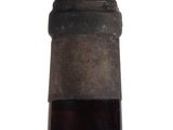 a close up of a bottle of beer on a white background