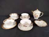 an image of a group of tea and coffee cups and saucers