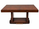 a wooden table with two square legs and a square top