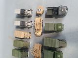 a lot of military vehicles that are lined up together