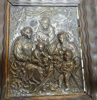 an image of a metal relief of a nativity scene