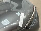 an image of a car with a parking ticket attached to it
