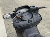 a black motorcycle parked on the side of the road
