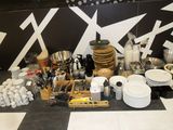 a picture of a kitchen counter with a lot of dishes and utensils on it