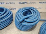 two blue hoses sitting on top of a table next to each other