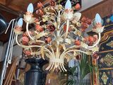 a chandelier hanging from the ceiling in a room