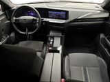 the interior of a car with a steering wheel, dashboard, and dash board