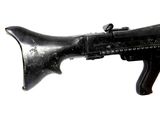 a toy gun that is on display on a white surface