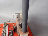 a small model of a steam engine on a table