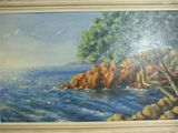 un tableau sur le mur d'une pièce où se trouve un tableau