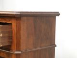 a wooden desk with a drawer on top of it