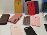 many cell phones that are sitting on a table