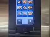 a picture of a restaurant app on a stainless steel refrigerator