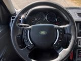 a car dashboard with a steering wheel and a dash board