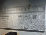 une photo d'un mur fait de cordes