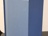 a blue box sitting on top of a black table