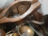 a pile of old wooden objects that are sitting on a table