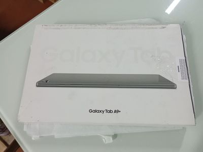 a box on the table that has a laptop in it