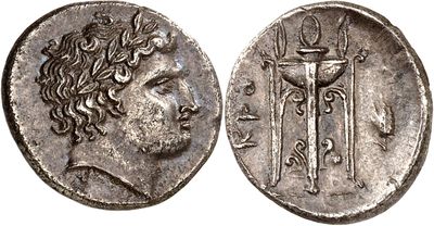 a silver coin with an image of a man holding a sword