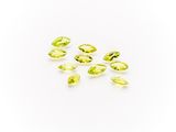 a group of yellow sapphires on a white background