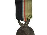 medal with a ribbon around the neck of it on a white background